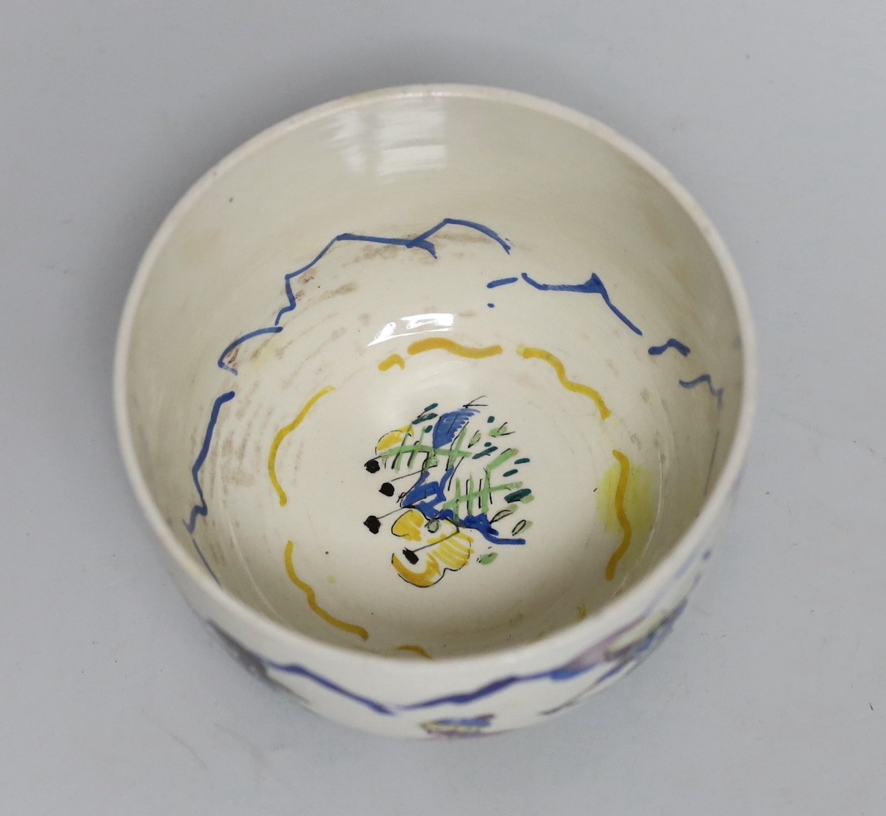 Jessie Marion King (1875-1949). A porridge bowl and cover, decorated with children playing, 9cm